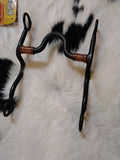 Kelly Handcrafted High Port Western bit with black steel shank and copper wire inlay.