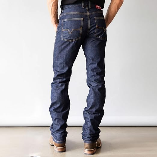 Person wearing Kimes Ranch blue jeans in style CAL  back view showing pockets.