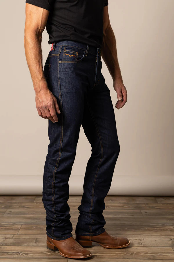 Person wearing Kimes Ranch dark blue jeans side profile