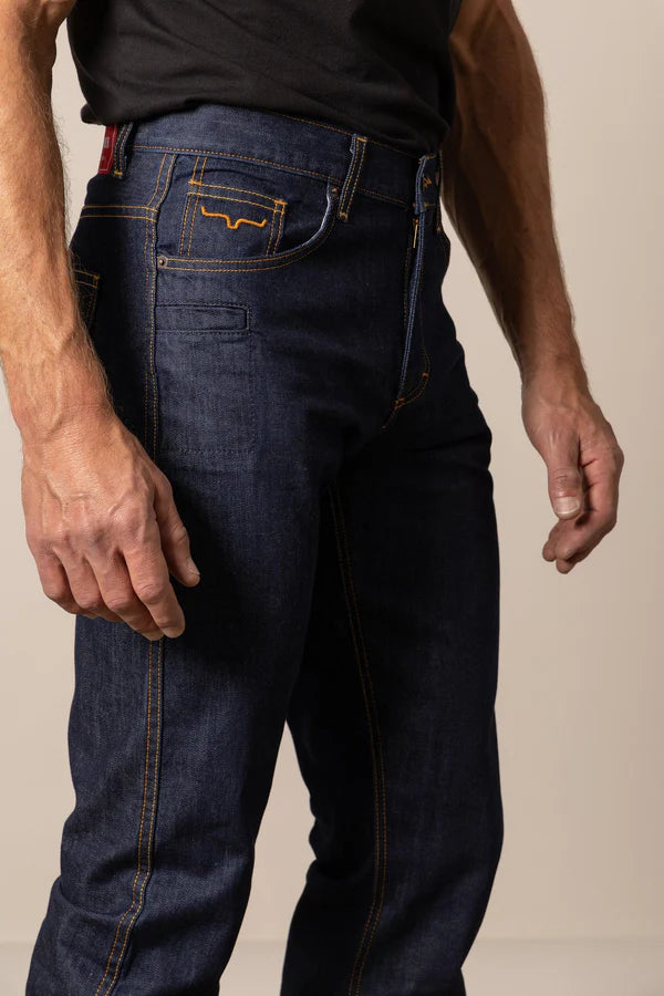 Person wearing Kimes Ranch Style CAL dark blue jeans side profile showing pockets
