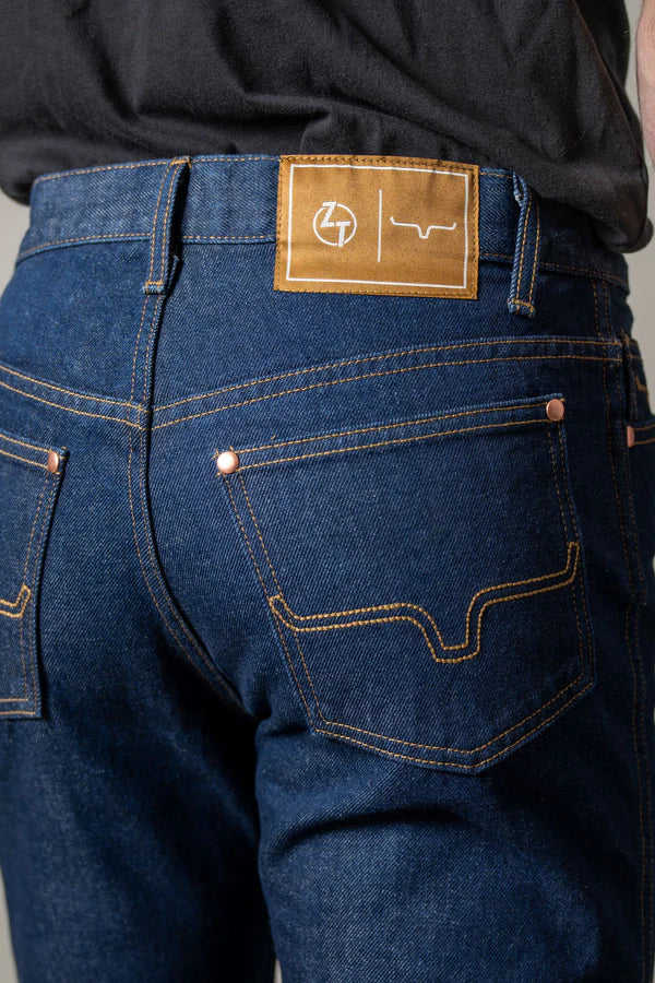 Male wearing Kimes Ranch Zach Top dark jeans hide pocket view.
