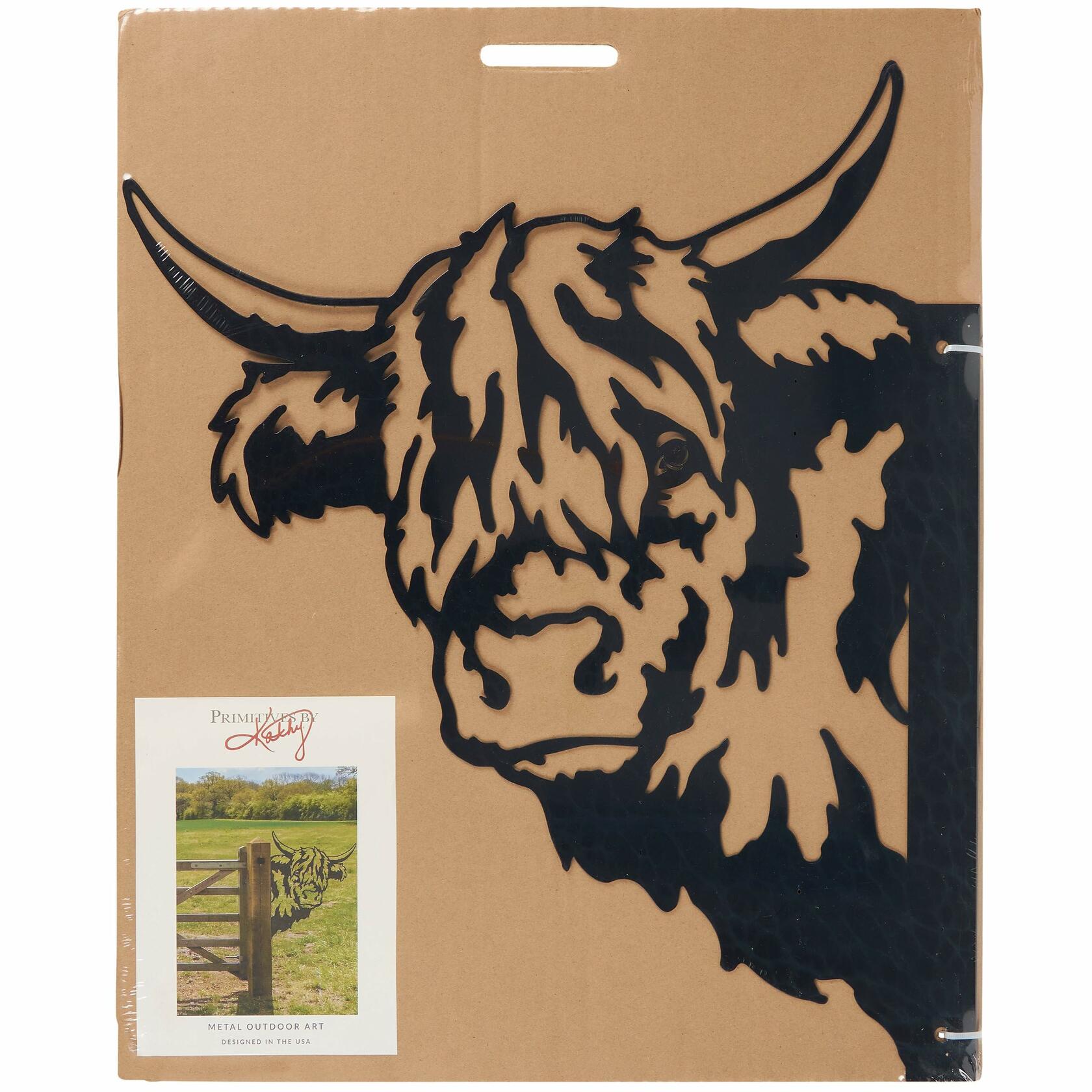 Whimsical metal highland cow silhouette in rustic finish, perfect for garden, porch, or barn decoration.