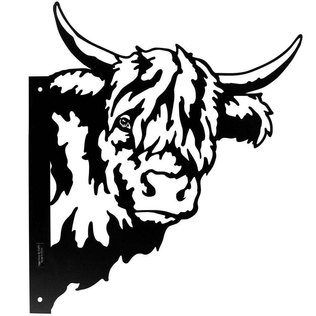 Cutout metal highland cow wall décor with shaggy hair and curved horns, mounted outdoors on wooden post.
