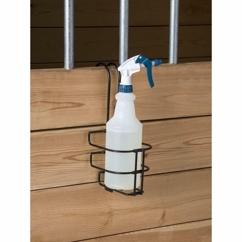 Tough-1 small collapsible black steel bottle holder for quart bottles, shown upright on barn stall.
