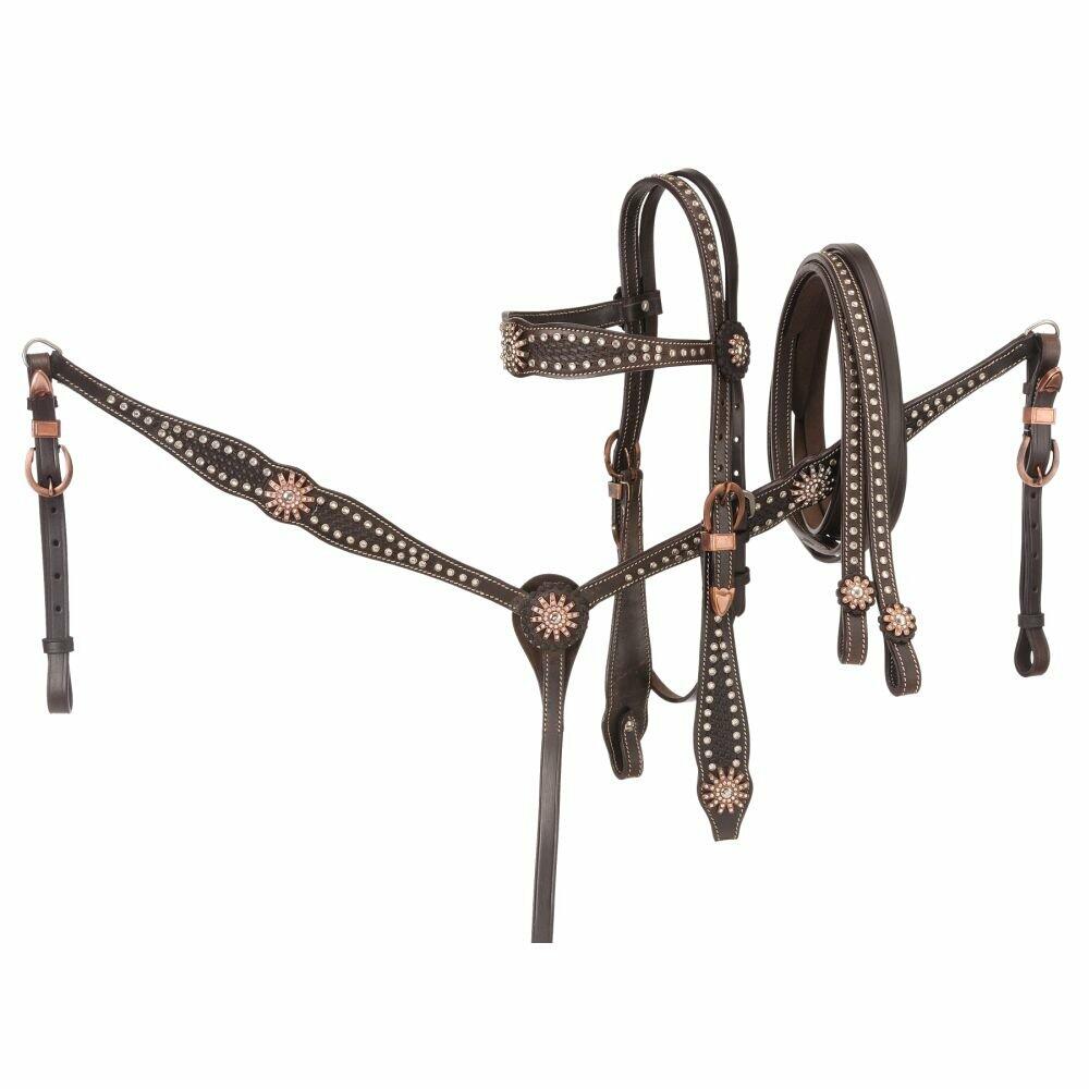 Brown leather horse bridle with decorative elements on a white background