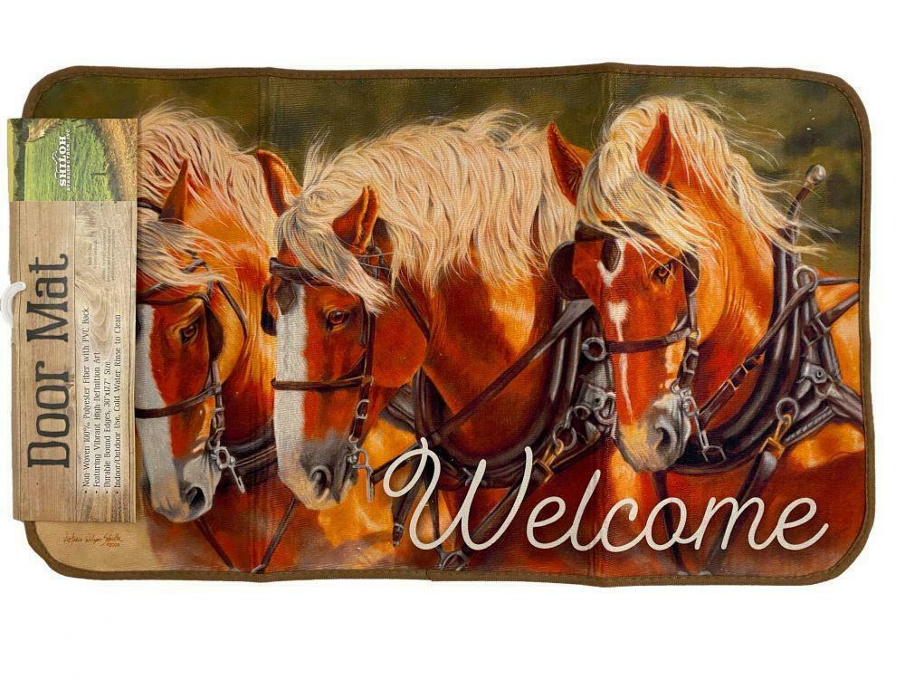 Decorative doormat with horses and 'Welcome' text on a white background