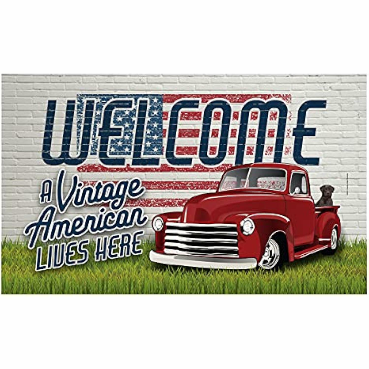 Vintage American truck with 'Welcome A Vintage American Lives Here' text on a brick wall background
