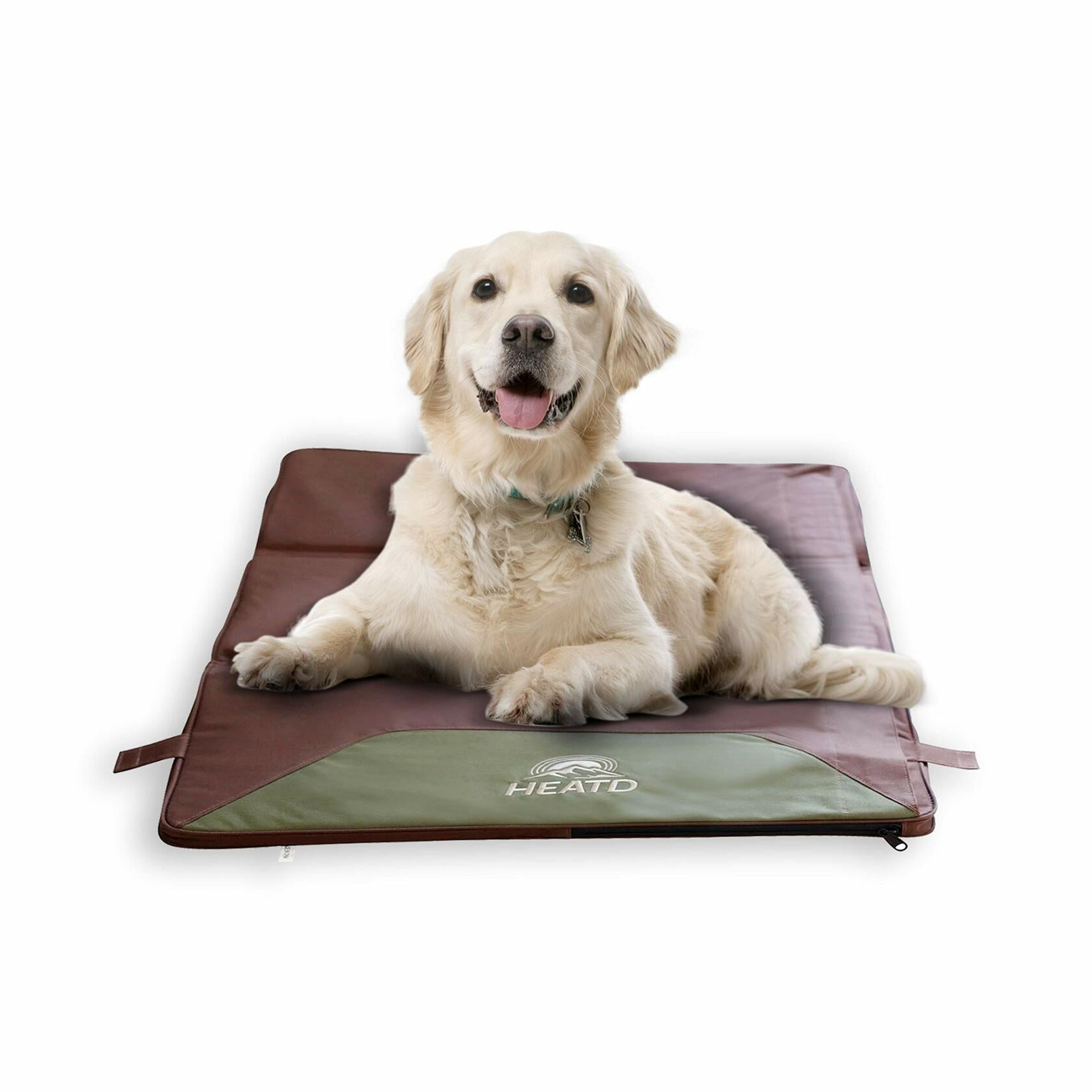 Dog lying on a HEATO branded pet mat with a white background
