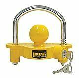 Yellow Reese coupler with U-bolt and keys on a white background