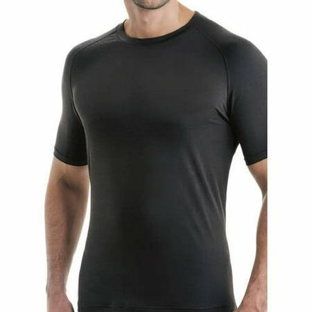 Man wearing a black short-sleeve compression shirt on a white background