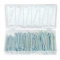 Set of metal eyelets in a clear plastic container with a white background