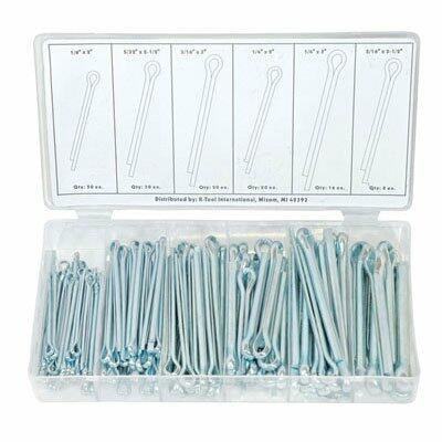 Set of metal eyelets in a clear plastic container with a white background