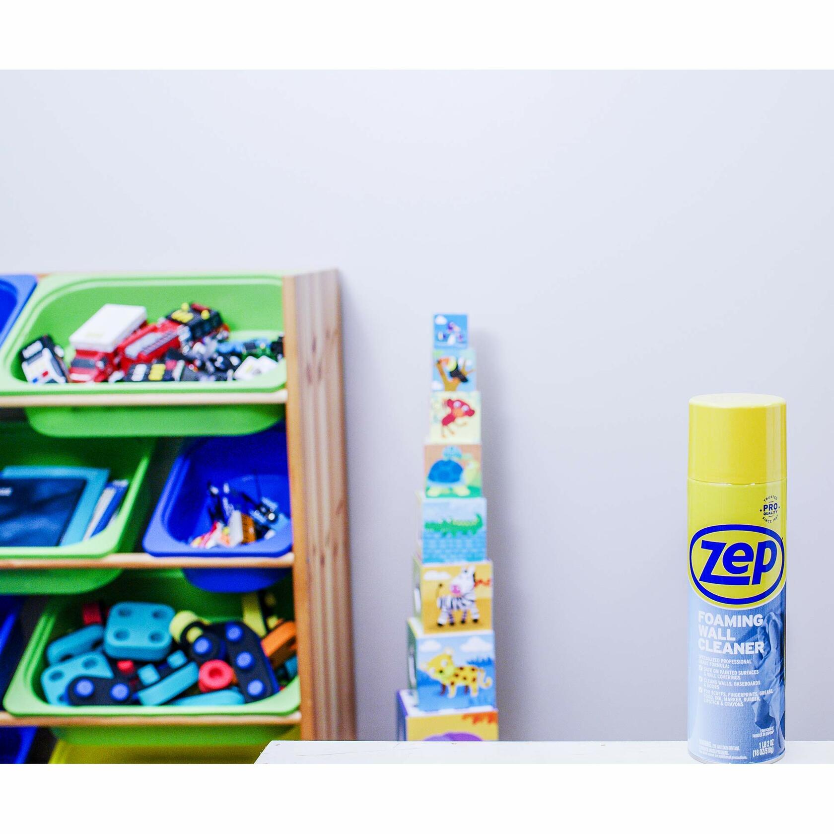 Zep foaming wall cleaner next to a toy shelf with toys and a measuring stick against a white wall.