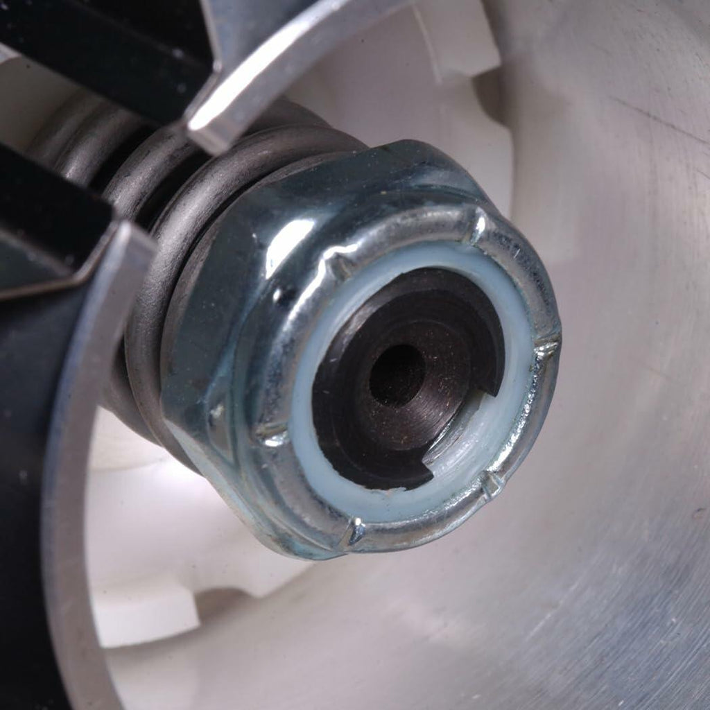 Close-up of a metal nut on a mechanical component