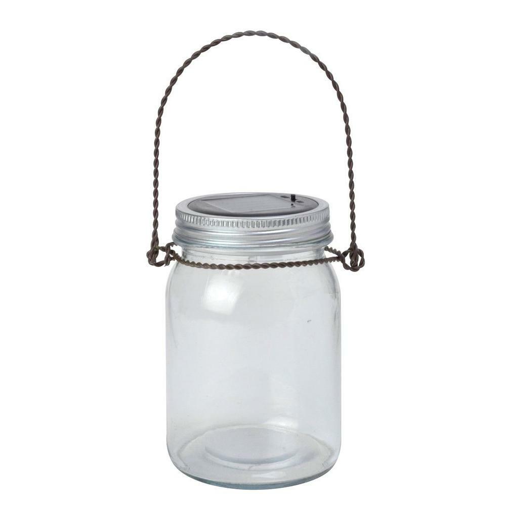 Clear glass jar with metal lid and rope handle on a white background