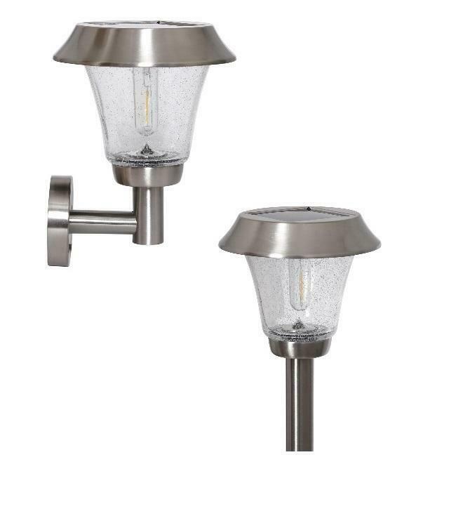 Two stainless steel outdoor lights, one wall-mounted and one on a post, on a white background.