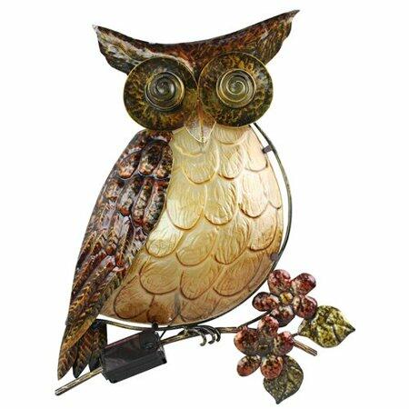 Decorative owl sculpture with a branch and berries on a white background