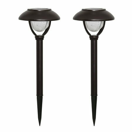 Two black solar garden lights on a white background