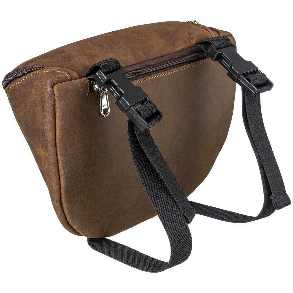 Brown leather waist bag with black strap on a white background