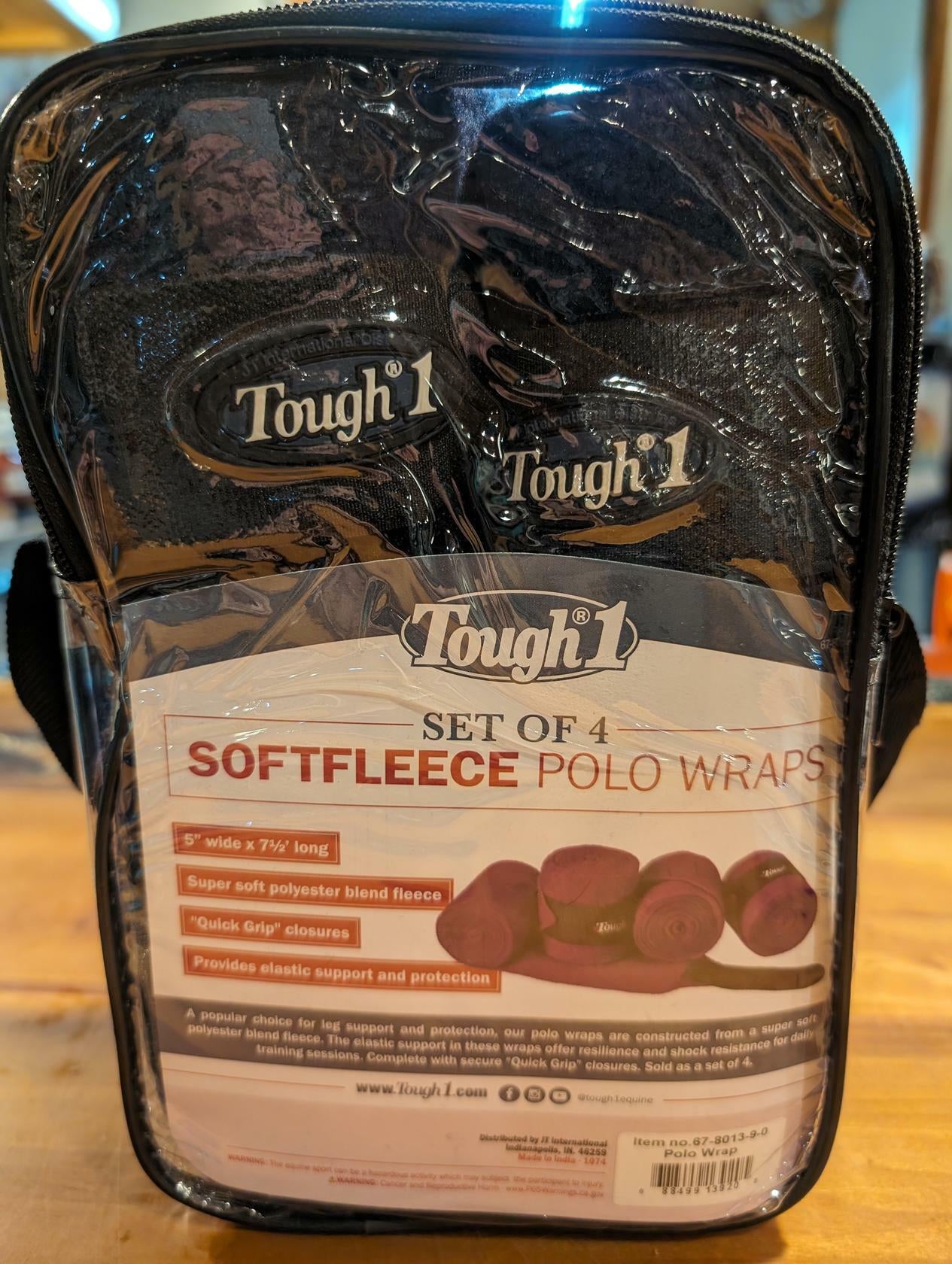 Packaged set of Tough 1 softfleece polo wraps on a wooden surface