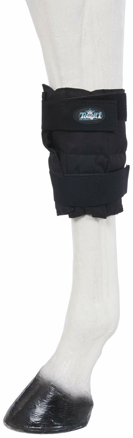 Black protective leg wrap on a white leg with black hoof
