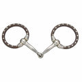 Horse bridle bit with metal rings on a white background