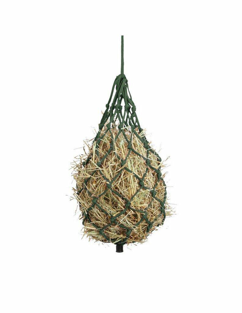 Hay ball in a green netting on a white background