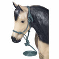 Horse head with a green rope halter on a white background