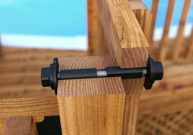 A close-up of a black metal bolt mounted onto a wooden deck post so the no trimming is needed.