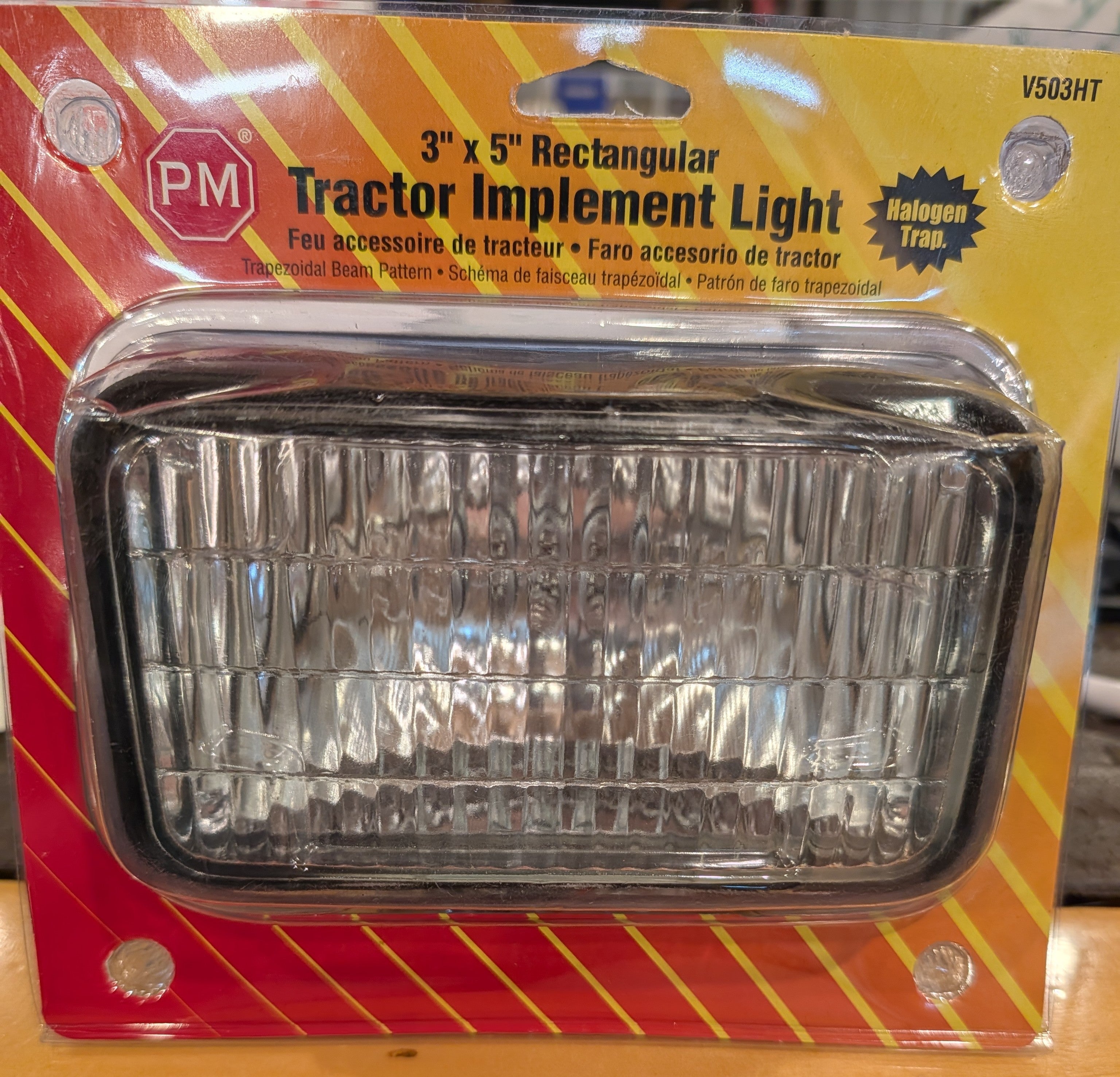 Rectangular tractor implement light in packaging