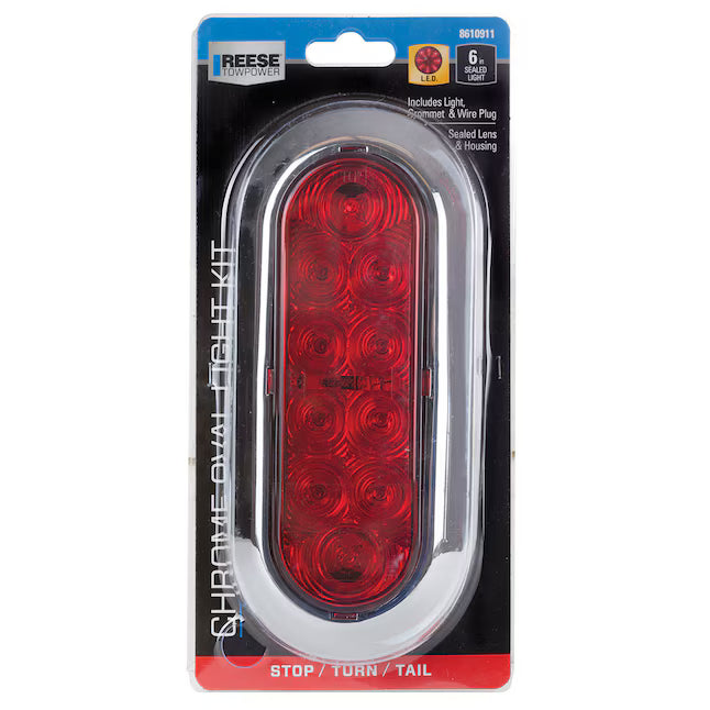 Reese Chrome Dual Light Kit stop and turn tail light in its original retail blister packaging, featuring a red oval light with a chrome bezel.