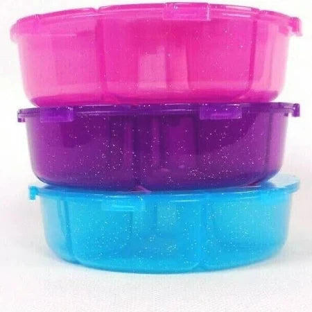 Three stacked plastic containers in pink, purple, and blue on a white background