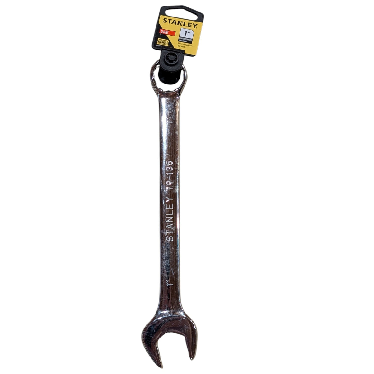 A Stanley 1 inch cross wrench with a black and yellow retail hanging tag, shown against a plain white background.