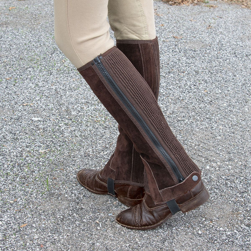 Showing how the suede half chaps fit to the leg