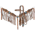 A medium-brown leather western headstall and breastcollar set featuring intricate Navajo-inspired geometric tooling and small copper dot borders. 