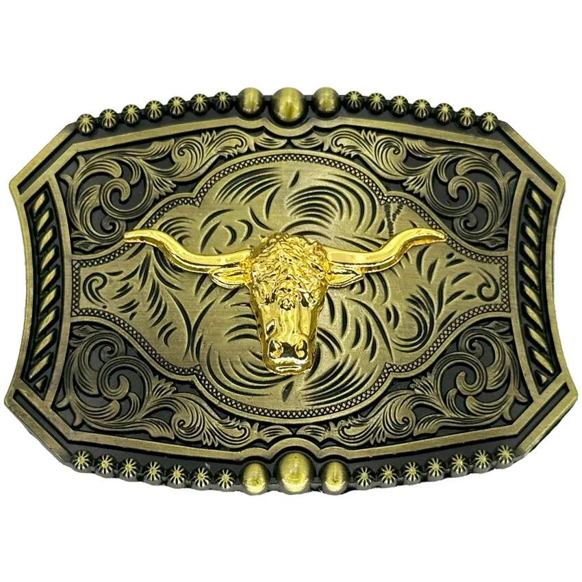 Vintage Western belt buckle featuring a raised gold longhorn head centered on an antique bronze floral engraved background with beaded edge trim.