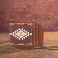 Coffee brown Wrangler by Montana West Southwestern print mini zip card holder displayed on a rustic wood background.